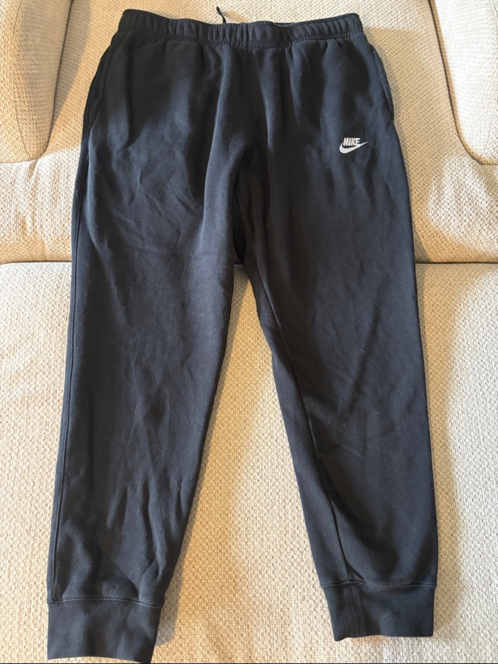 Nike Black Sweatpants with White Swoosh Logo